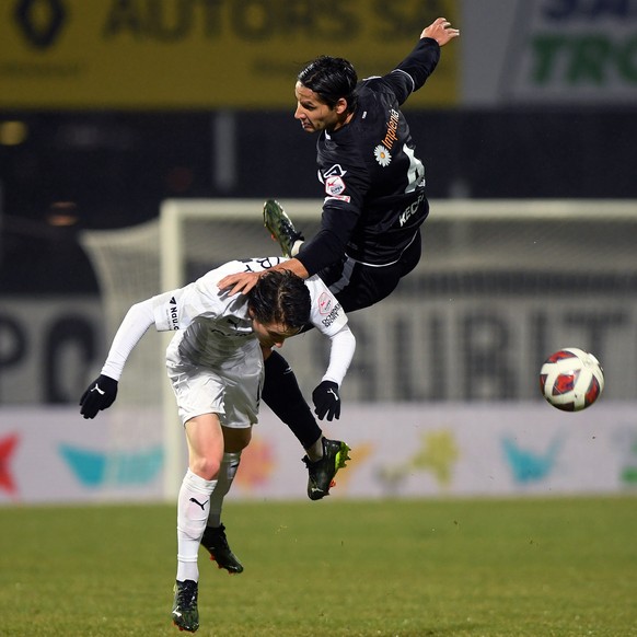 Lugano&#039;s player Akos Kecskes, right, fights for the ball with Vaduz&#039; player Matteo Di Giusto, left, during the Super League soccer match FC Lugano against FC Vaduz, at the Cornaredo stadium  ...