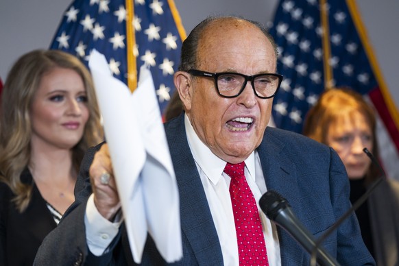 epa09299248 (FILE) - Lawyer to former US President Trump and former mayor of New York City Rudy Giuliani (C) speaks about the president&#039;s legal challenges to his election loss, in Washington, DC, ...