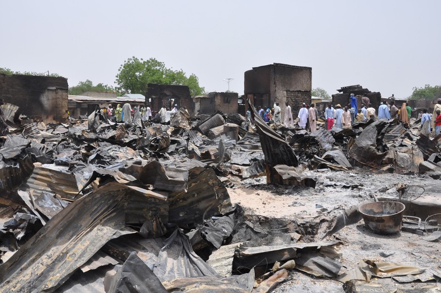 Und solche Attacken sind nicht neu: Dieses Bild vom Mai 2014 zeigen zerstörte Häuser nach einem Boko-Haram-Angriff.