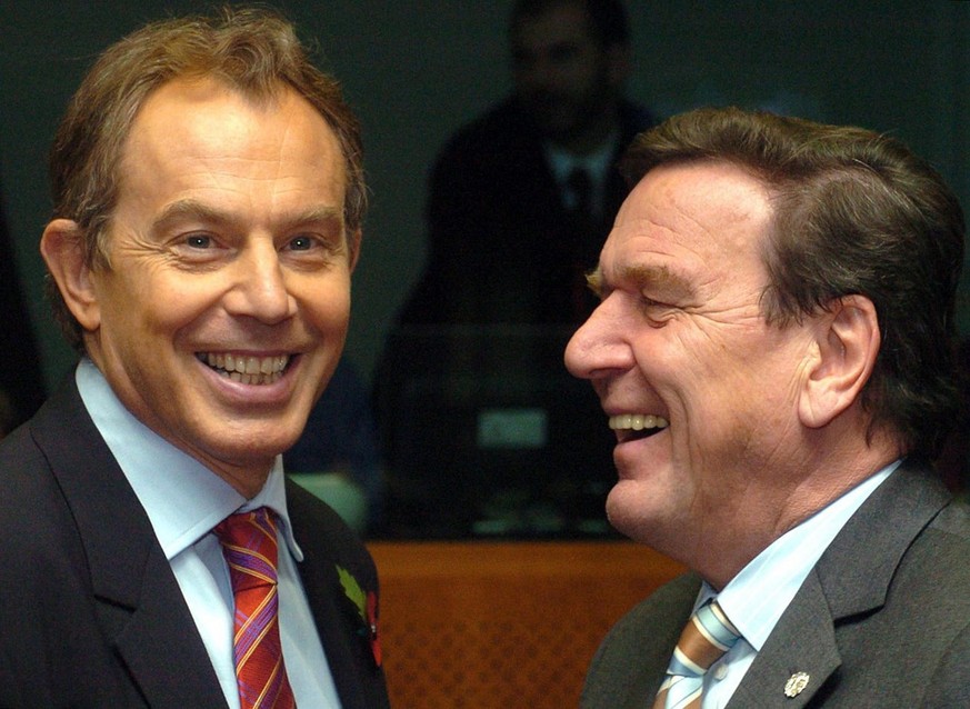 Britain Prime Minister Tony Blair (L) and German Chancellor Gerhard Schroeder (R) pictured at the begining of a two days EU summit in Brussels, Thursday 04 November 2004. EPA/BENOIT DOPPAGNE