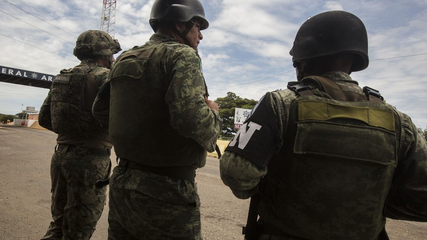National Guards provide perimeter security at an immigration checkpoint in Arriaga, on Mexico&#039;s southern border, Sunday, June 23, 2019. Pressured by the U.S., Mexico’s government has deployed som ...