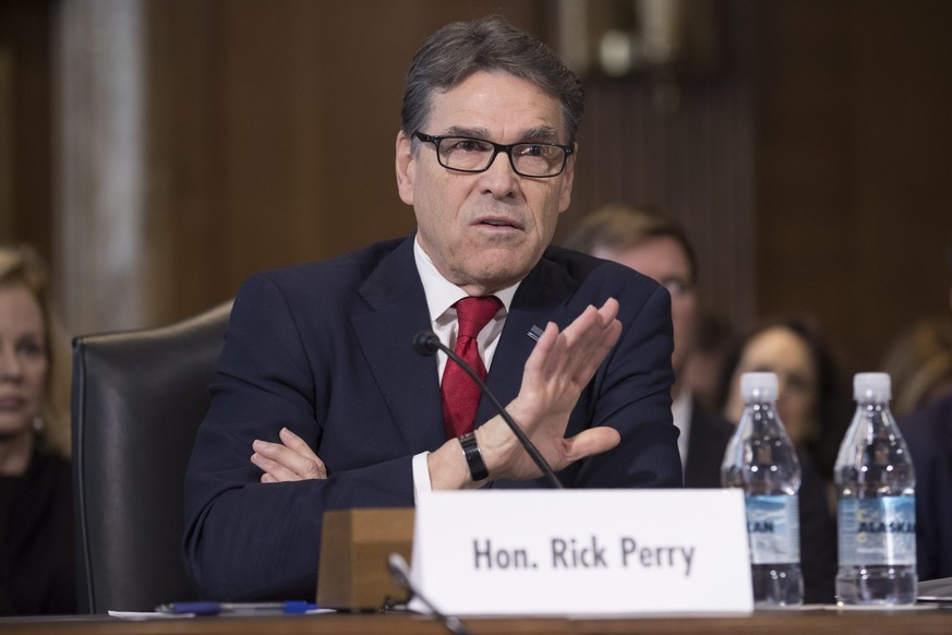 epa05731942 Former governor of Texas and US President-elect Donald Trump&#039;s nominee to be the Secretary of Energy, Rick Perry, appears before the Senate Energy and Natural Resources Committee hear ...