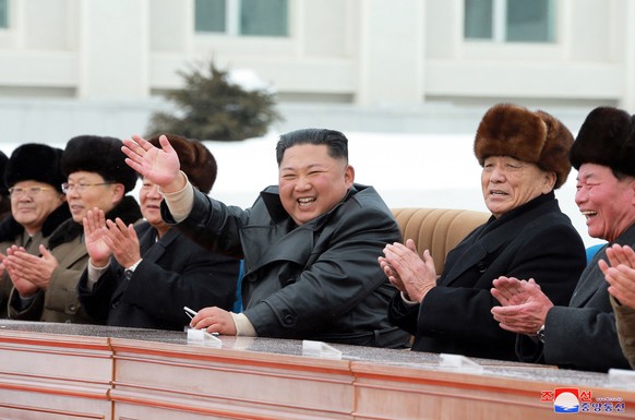 epa08040325 A photo released by the official North Korean Central News Agency (KCNA) shows North Korea&#039;s leader Kim Jong Un (C) during a ribbon-cutting ceremony to open a Township of Samjiyon Cou ...