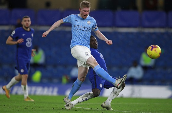 Manchester City&#039;s Kevin De Bruyne is challenged by Chelsea&#039;s N&#039;Golo Kante during the English Premier League soccer match between Chelsea and Manchester City at Stamford Bridge, London,  ...