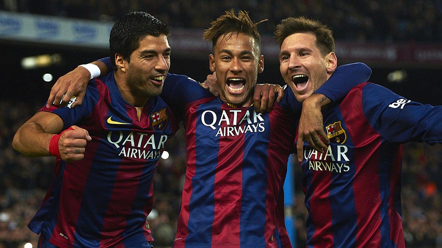 FILE - In this Jan. 11, 2015 file photo, FC Barcelona&#039;s Lionel Messi, from Argentina, right, Neymar, from Brazil, center, and Luis Suarez, from Uruguay, celebrate after scoring against Atletico M ...