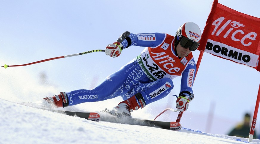 Daniel Albrecht, of Switzerland, speeds down the course during a men&#039;s super-G, at the alpine ski, World Cup finals, in Bormio, Italy, Thursday, March 13, 2008. (AP Photo/Marco Trovati)
