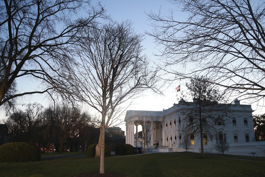 The White House in the early morning of Wednesday, Dec. 18, 2019 in Washington. President Donald Trump is on the cusp of being impeached by the House, with a historic debate set Wednesday on charges t ...
