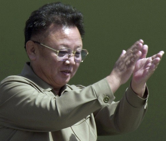 FILE - In this April 25, 2002, file photo, then North Korean leader Kim Jong Il claps from the balcony as soldiers salute him during a military parade, celebrating the foundation of the armed forces i ...