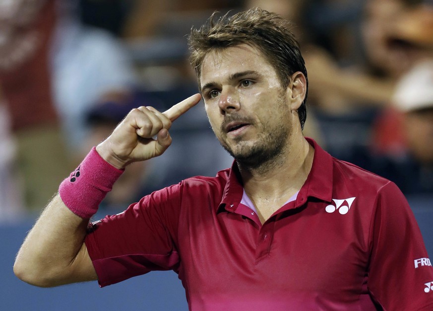 Stan Wawrinka, of Switzerland, reacts after winning the fourth set against Daniel Evans, of Britain, during the third round of the U.S. Open tennis tournament, Saturday, Sept. 3, 2016, in New York. (A ...