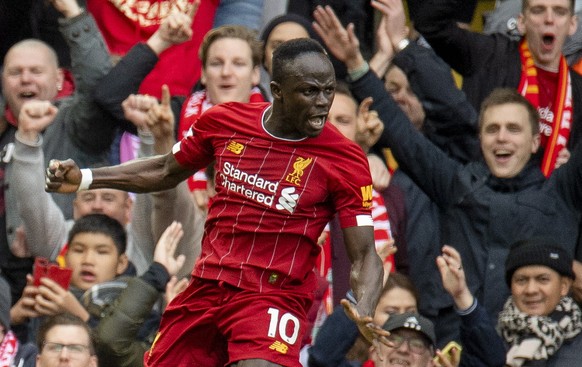 epa08276278 Liverpool&#039;s Sadio Mane celebrates after scoring during the English Premier League soccer match between Liverpool and Bournemouth at Anfield, Liverpool, Britain, 07 March 2020. EPA/PET ...