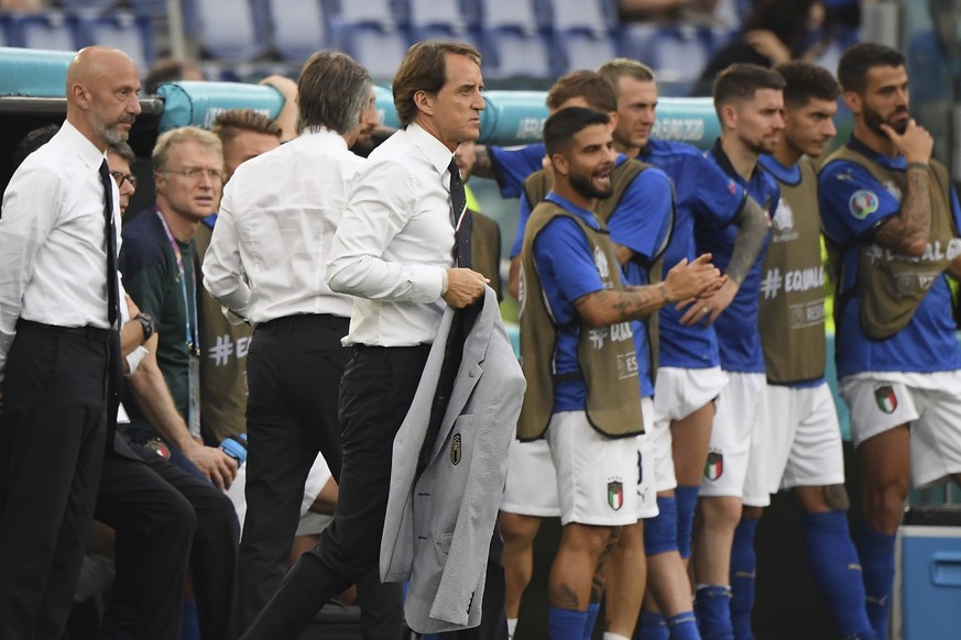 Italy&#039;s manager Roberto Mancini, center, reacts at the end of the Euro 2020 soccer championship group A match between Italy and Wales at the Stadio Olimpico stadium in Rome, Sunday, June 20, 2021 ...