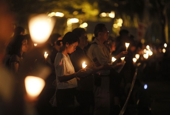 Tens of thousands of people attend an annual candlelight vigil at Hong Kong&#039;s Victoria Park, Monday, June 4, 2018. Hong Kongers commemorate victims of the Chinese government&#039;s brutal militar ...